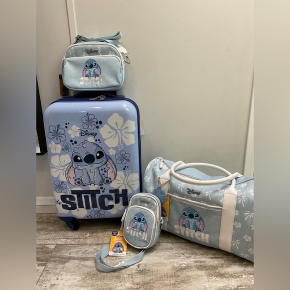 Disney Handbags - NWT Disney Lilo and stitch luggage Carry On, weekender, crossbody and phone bag